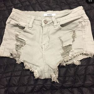 army green ripped jean shorts